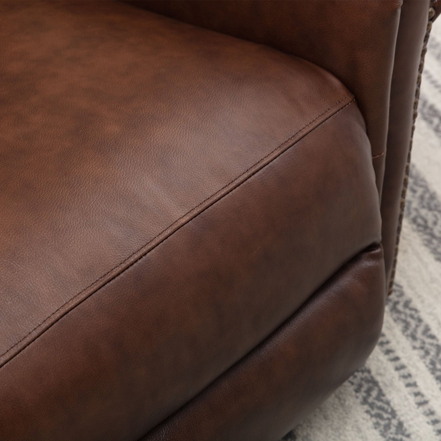 Fauteuil inclinable en cuir véritable avec accoudoirs et dossier confortables