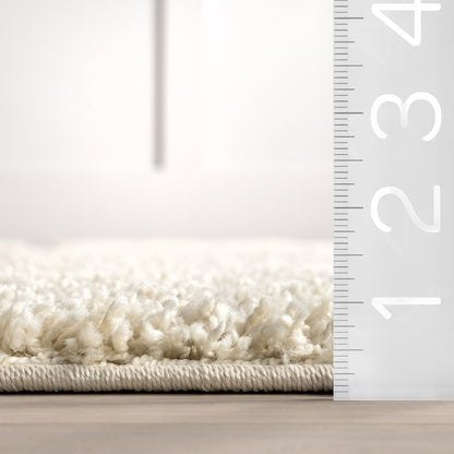 Tapis à poils longs Nuloom Krista contemporain à motifs tourbillonnants