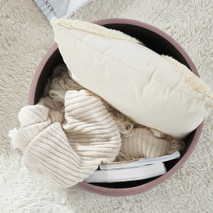 Pouf de rangement rond capitonné Donovan