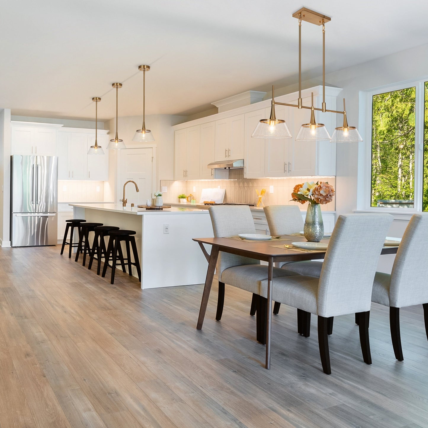 Lustre linéaire suspendu à 3 lumières en verre bullé doré moderne Mola pour salle à manger