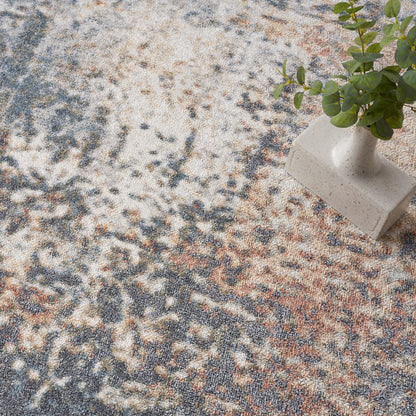 Tapis Nourison Astra lavable en machine à motifs abstraits