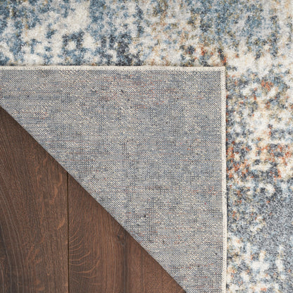 Tapis Nourison Astra lavable en machine à motifs abstraits