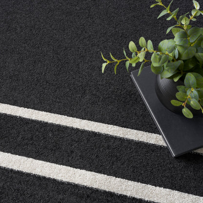 Tapis d'intérieur/extérieur uni Nourison Essentials