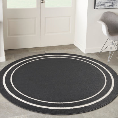 Tapis d'intérieur/extérieur uni Nourison Essentials