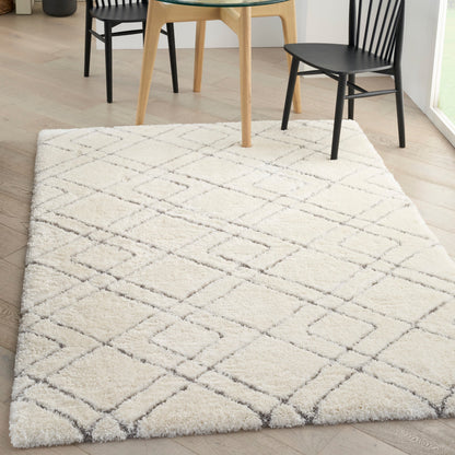 Tapis Nourison Luxueux à poils longs ultra moelleux, motif géométrique abstrait