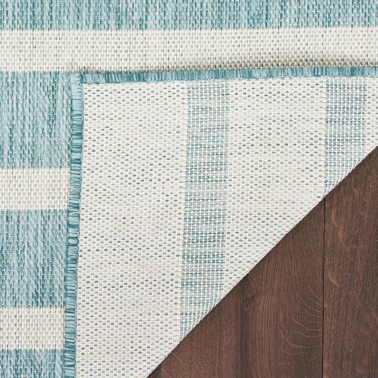 Tapis rayé d'intérieur/extérieur Nourison Selerno.