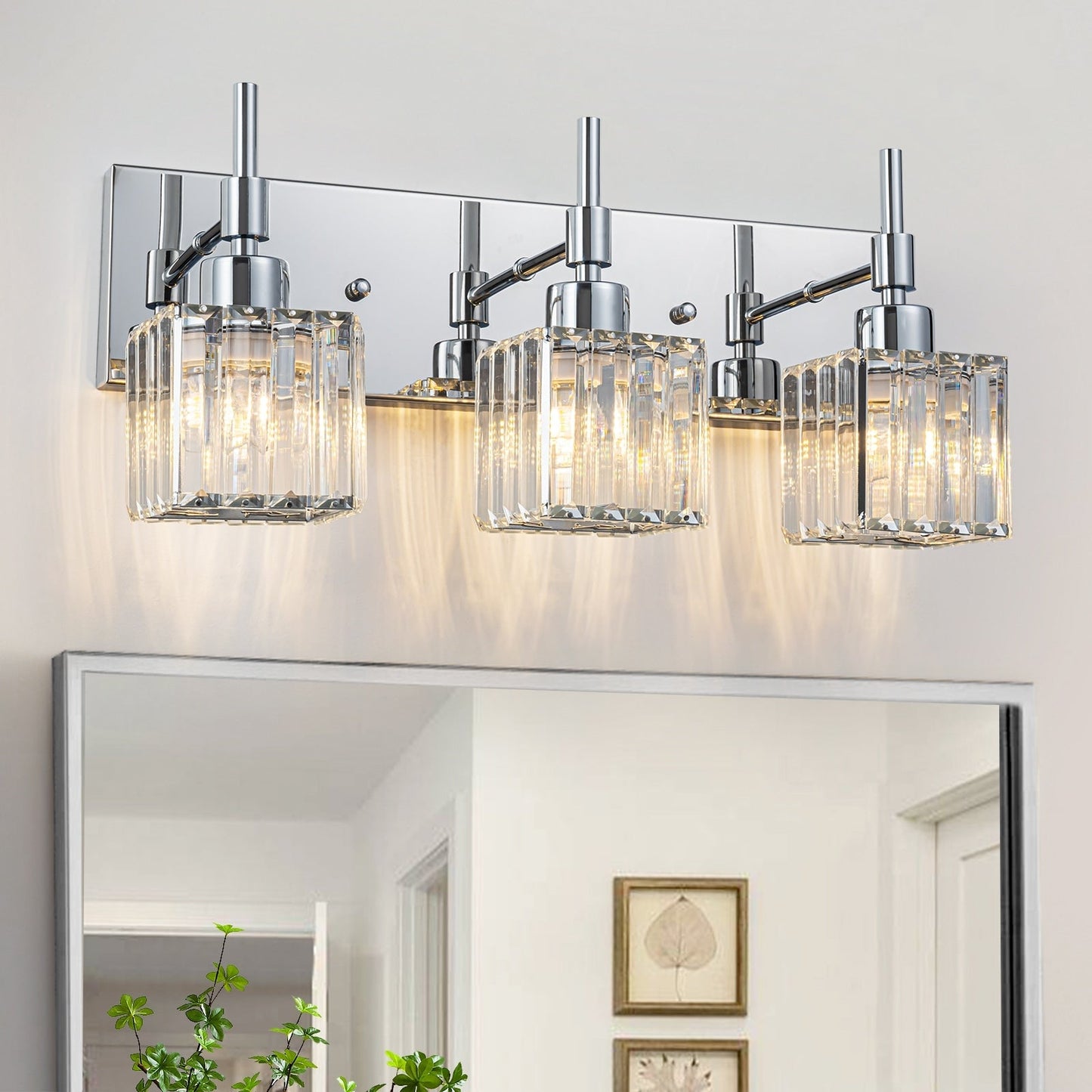 Luminaires de salle de bain modernes à intensité variable en cristal Ora, à installer au-dessus du miroir, style glamour.