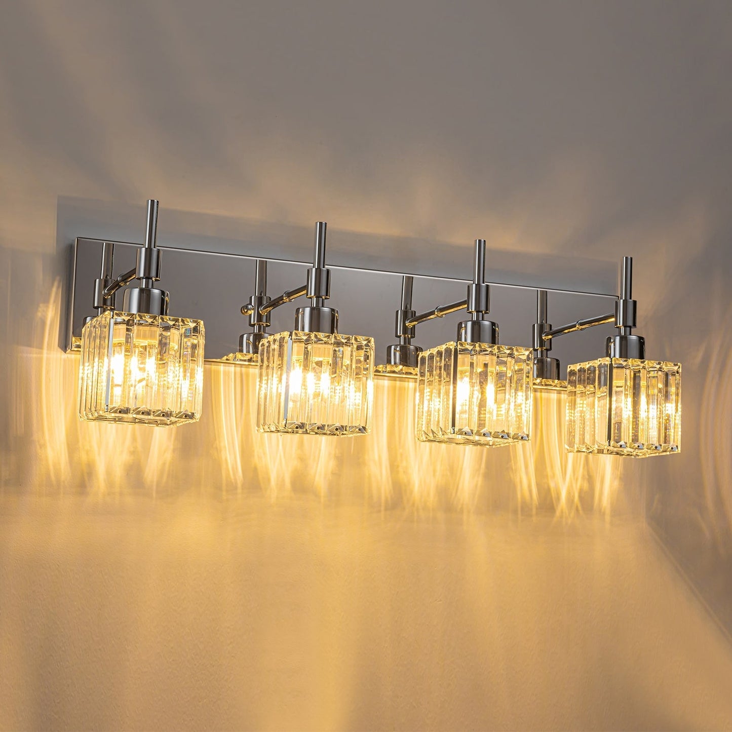 Luminaires de salle de bain modernes à intensité variable en cristal Ora, à installer au-dessus du miroir, style glamour.
