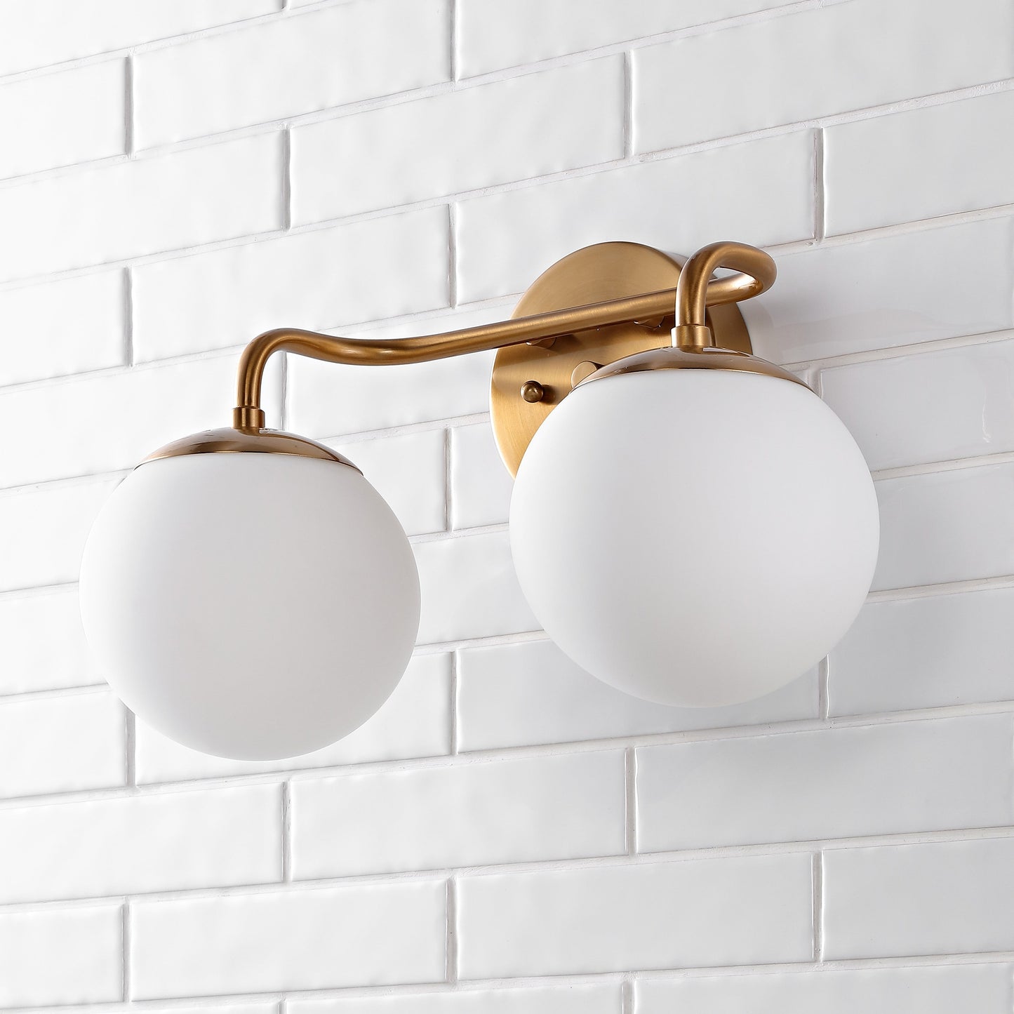 Meuble-lavabo moderne Globe en métal et verre dépoli avec éclairage LED, par JONATHAN Y