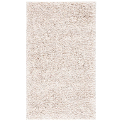 Tapis SAFAVIEH August Wilhelma Shag uni de 3 cm d'épaisseur