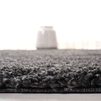 Tapis SAFAVIEH August Wilhelma Shag uni de 3 cm d'épaisseur