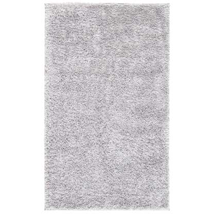 Tapis SAFAVIEH August Wilhelma Shag uni de 3 cm d'épaisseur
