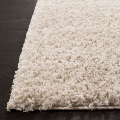 Tapis SAFAVIEH August Wilhelma Shag uni de 3 cm d'épaisseur