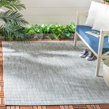 Tapis de patio/jardin imperméable SAFAVIEH Courtyard Begajeta pour intérieur/extérieur.