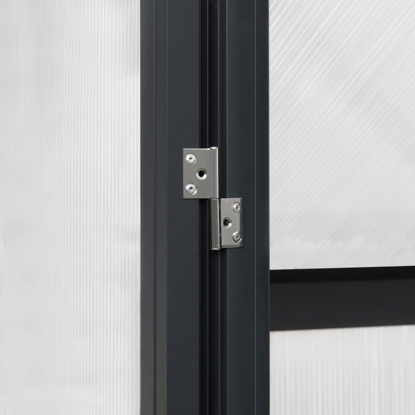 Serre de jardin VEIKOUS en aluminium, gris, avec aération de toit réglable et porte verrouillable.