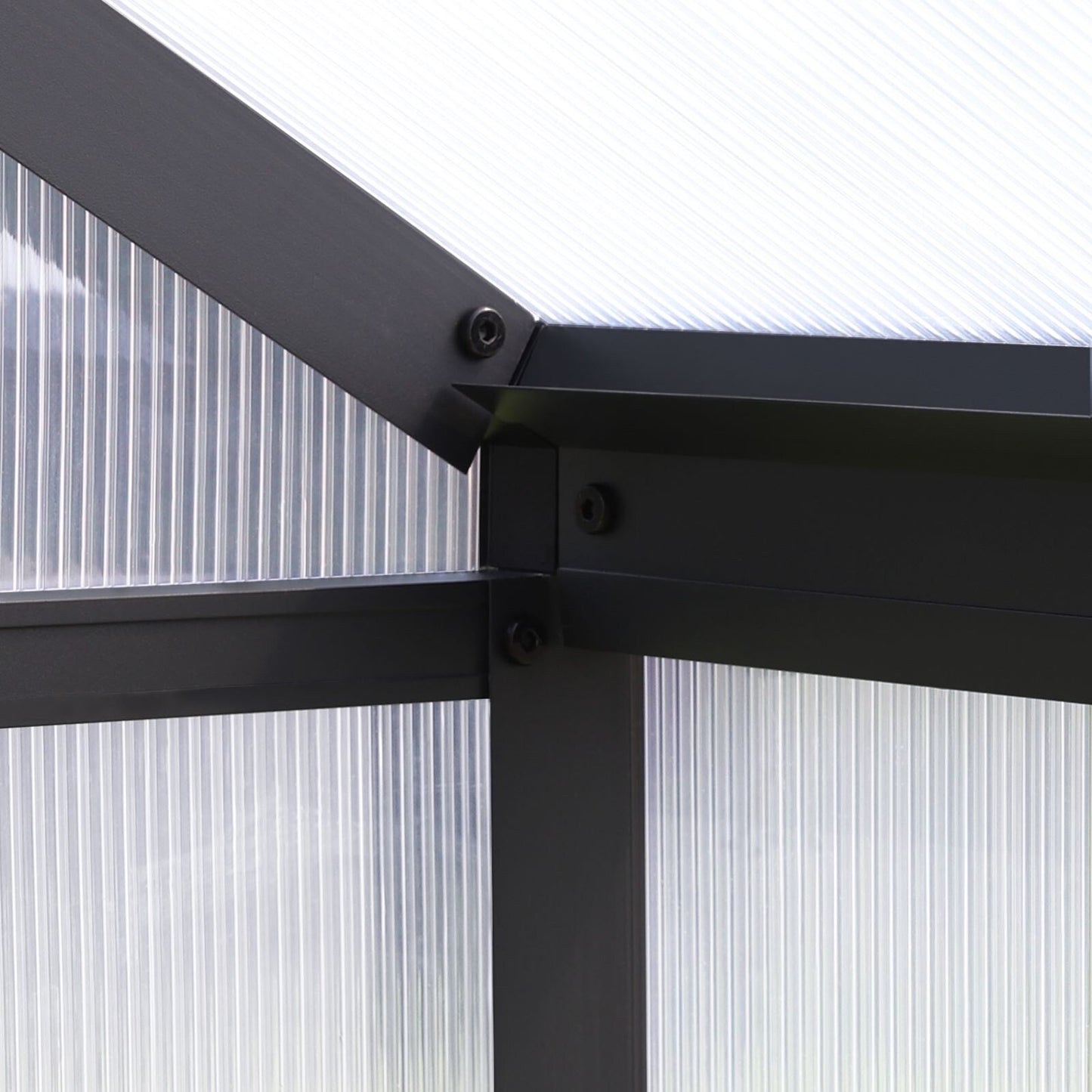 Serre de jardin VEIKOUS en aluminium, gris, avec aération de toit réglable et porte verrouillable.