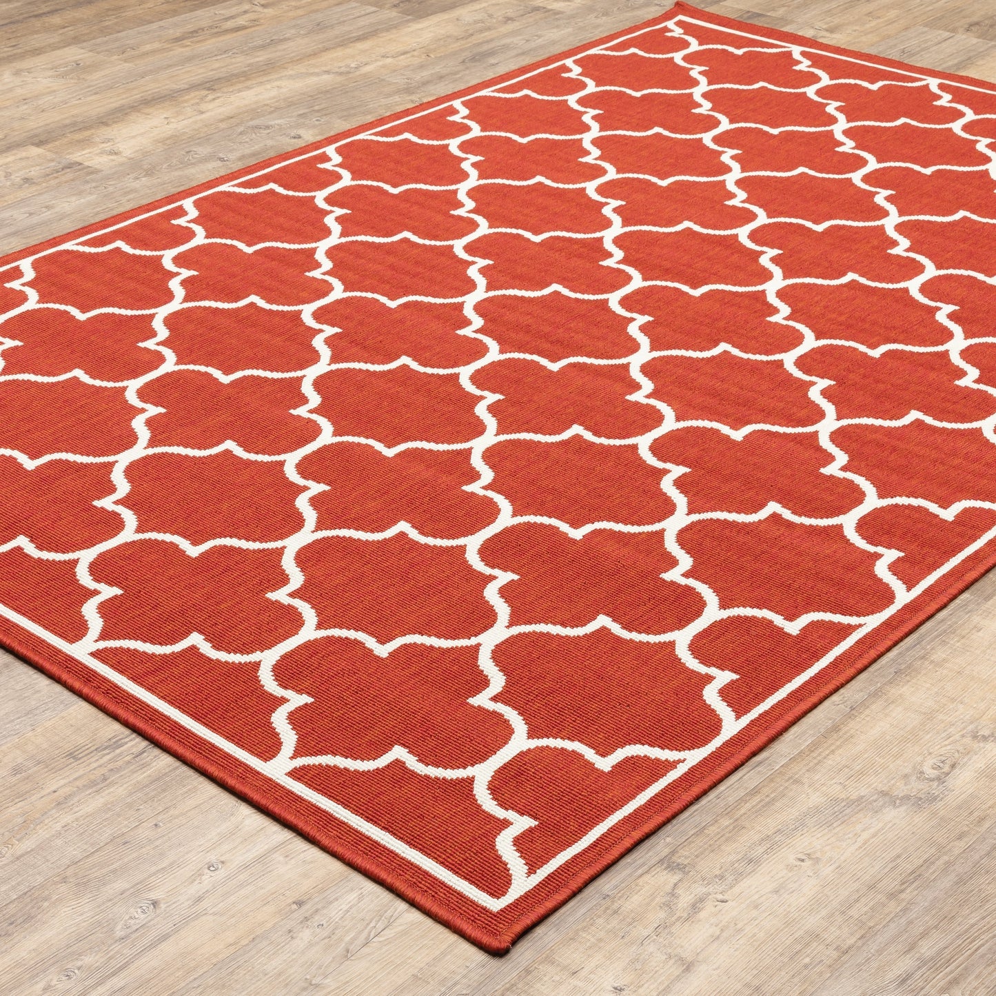 Tapis d'intérieur/extérieur Vista Home Martinique à motif treillis blanc cassé/rouge brique.