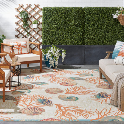 Tapis d'intérieur/extérieur Waverly Sun &amp; Shade Shore Thing Tropical Sea Shell Floral