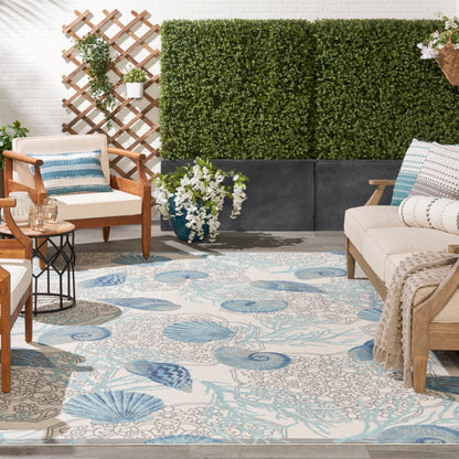 Tapis d'intérieur/extérieur Waverly Sun &amp; Shade Shore Thing Tropical Sea Shell Floral