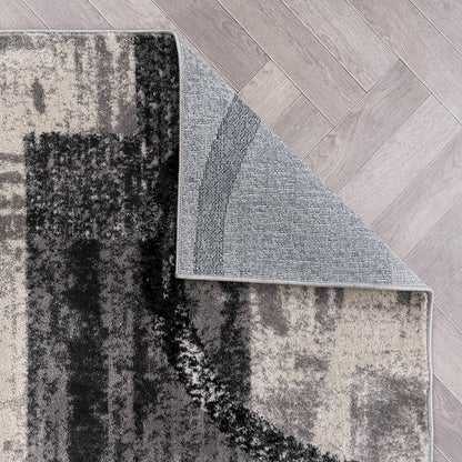 Tapis rond abstrait en polypropylène fabriqué à la machine par World Rug Gallery