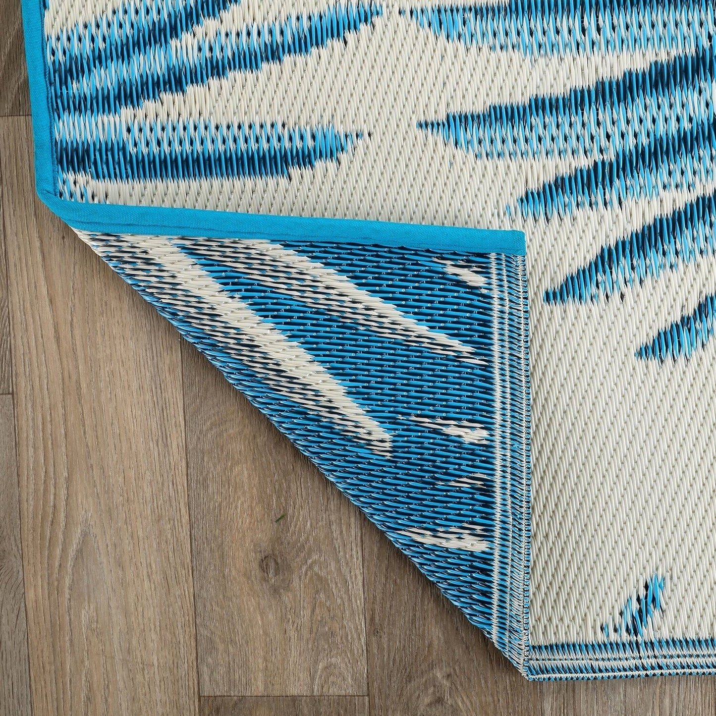 Tapis d'extérieur réversibles en plastique recyclé à motif floral tropical de World Rug Gallery